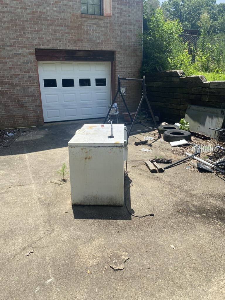 Garage Cleanout before Toss It cleanout in Valley, AL