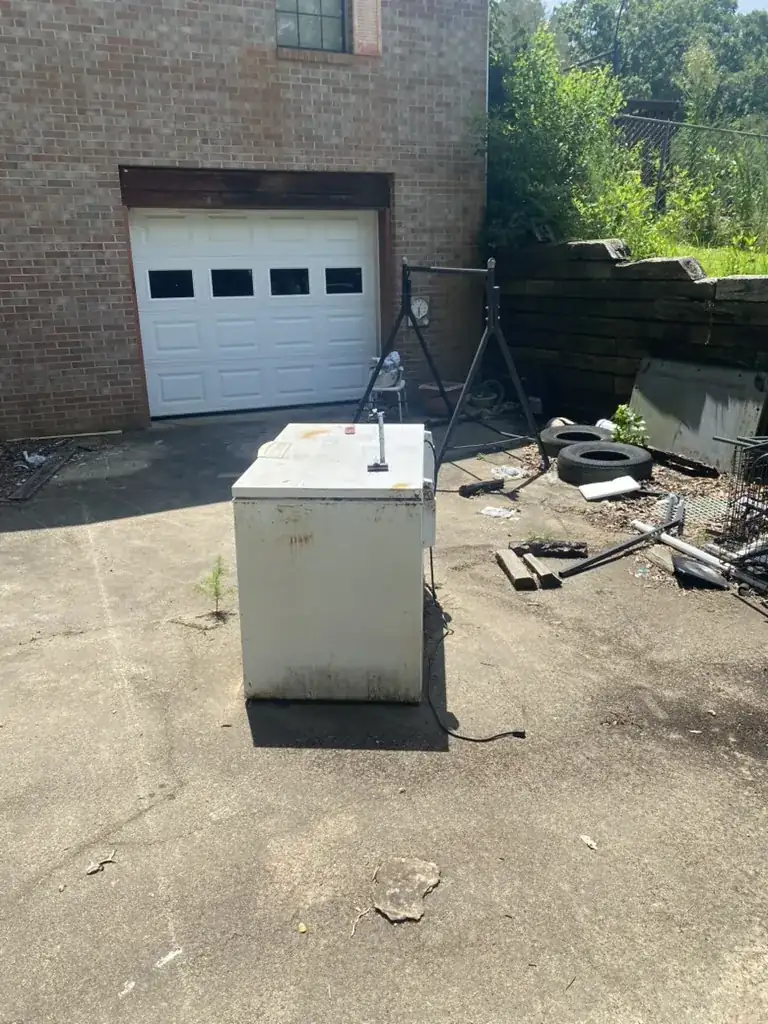 Garage Cleanout before Toss It cleanout in Valley, AL